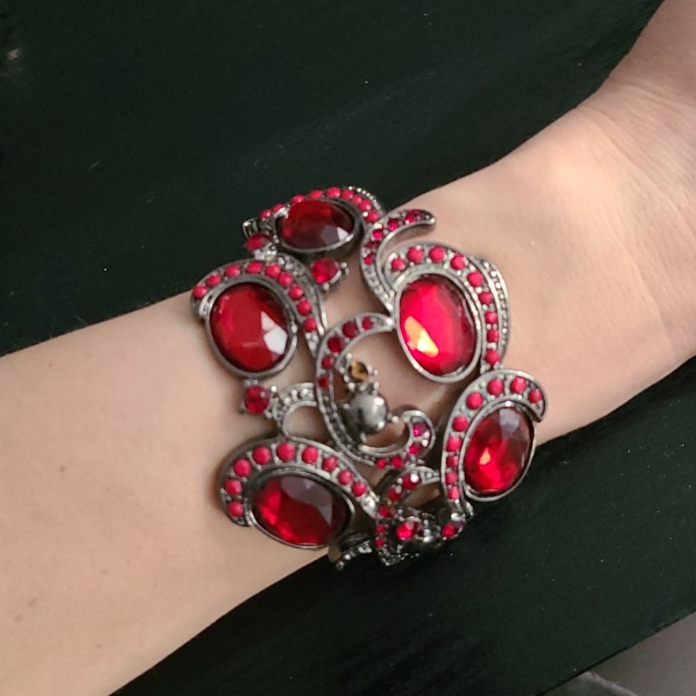 Like New dark metal / red stone costume bracelet
